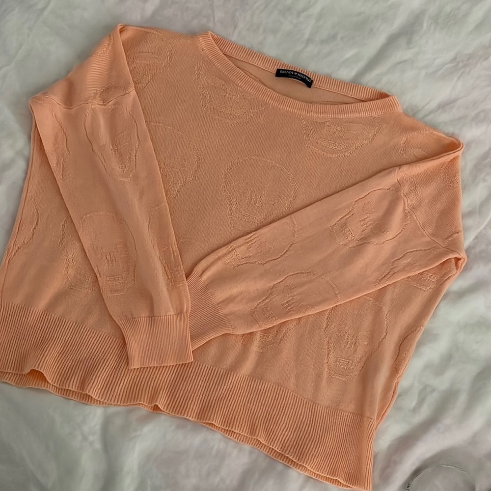 Brandy Melville cropped knit sweater with skull pattern in pale peach